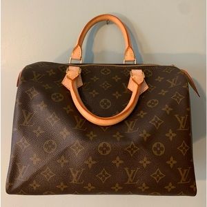 Speedy 25 Louis Vuitton Hand Bag